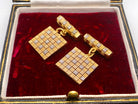 boxed A pair of 18 carat gold cuff links by famous London designer Roy King.