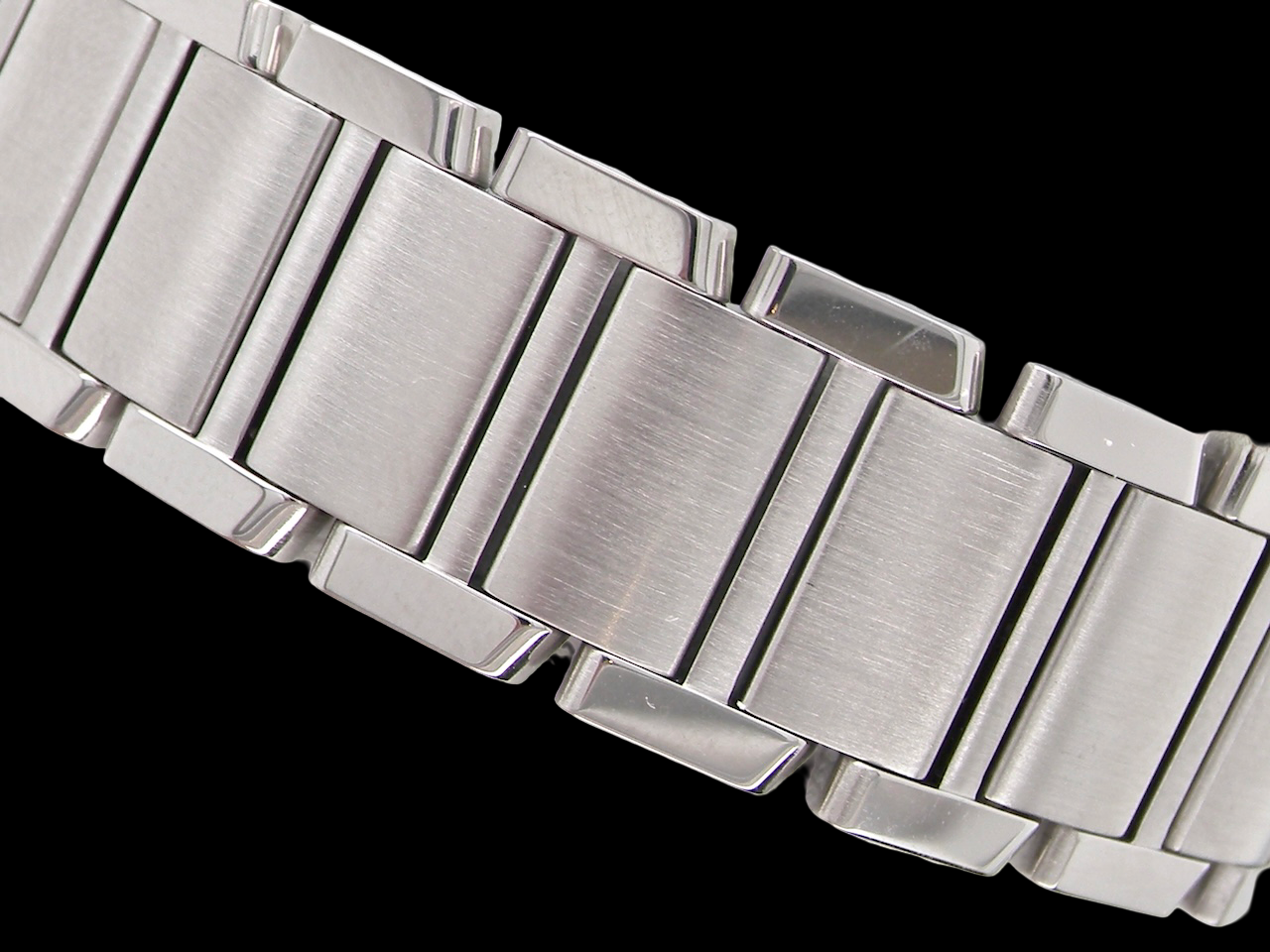 A woman's Cartier Tank Francaise wrist watch