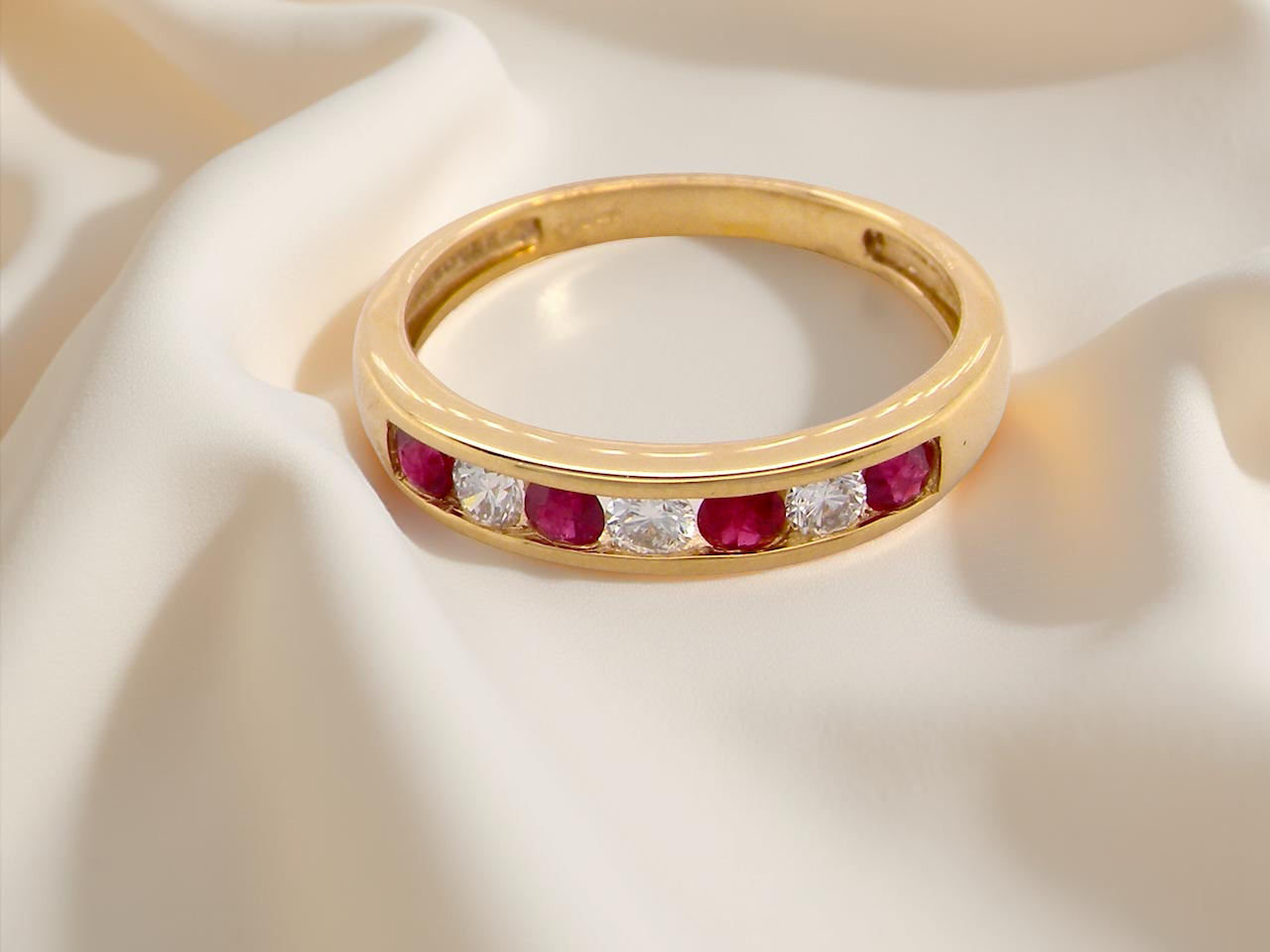 A channel set Ruby and Diamond ring