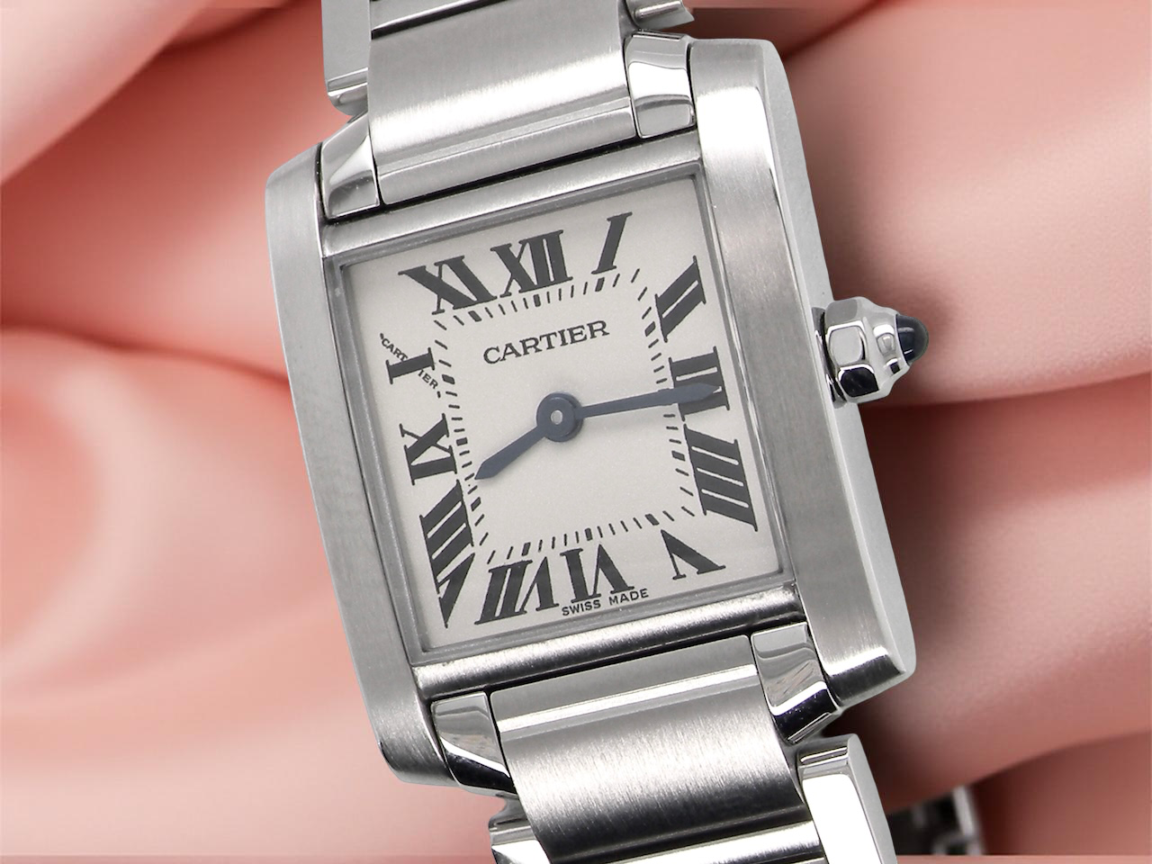A woman's Cartier Tank Francaise wrist watch