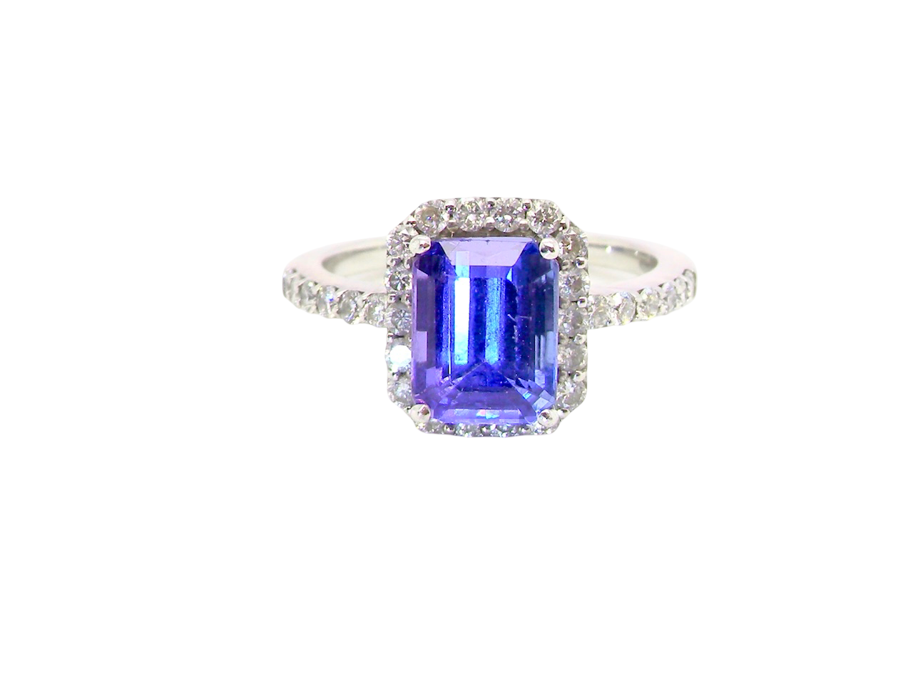  cluster ring featuring a 4A quality Tanzanite as its centre stone.  A