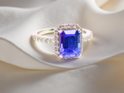  cluster ring featuring a 4A quality Tanzanite as its centre stone.  B