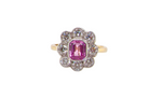  cluster ring featuring a beautiful cushion-cut pink sapphire 