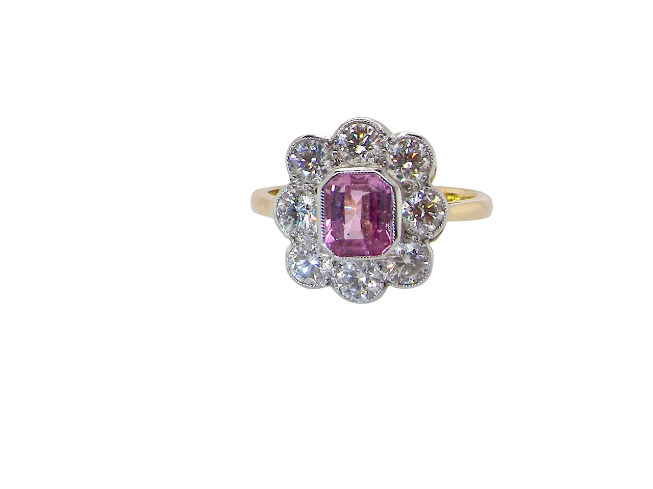  cluster ring featuring a beautiful cushion-cut pink sapphire  A