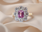  cluster ring featuring a beautiful cushion-cut pink sapphire  B