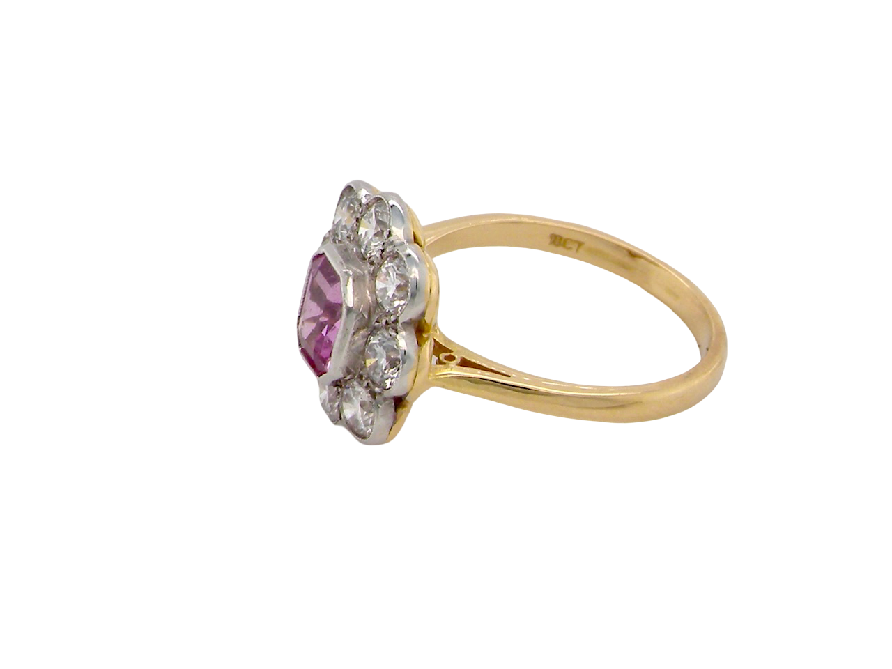  cluster ring featuring a beautiful cushion-cut pink sapphire  side