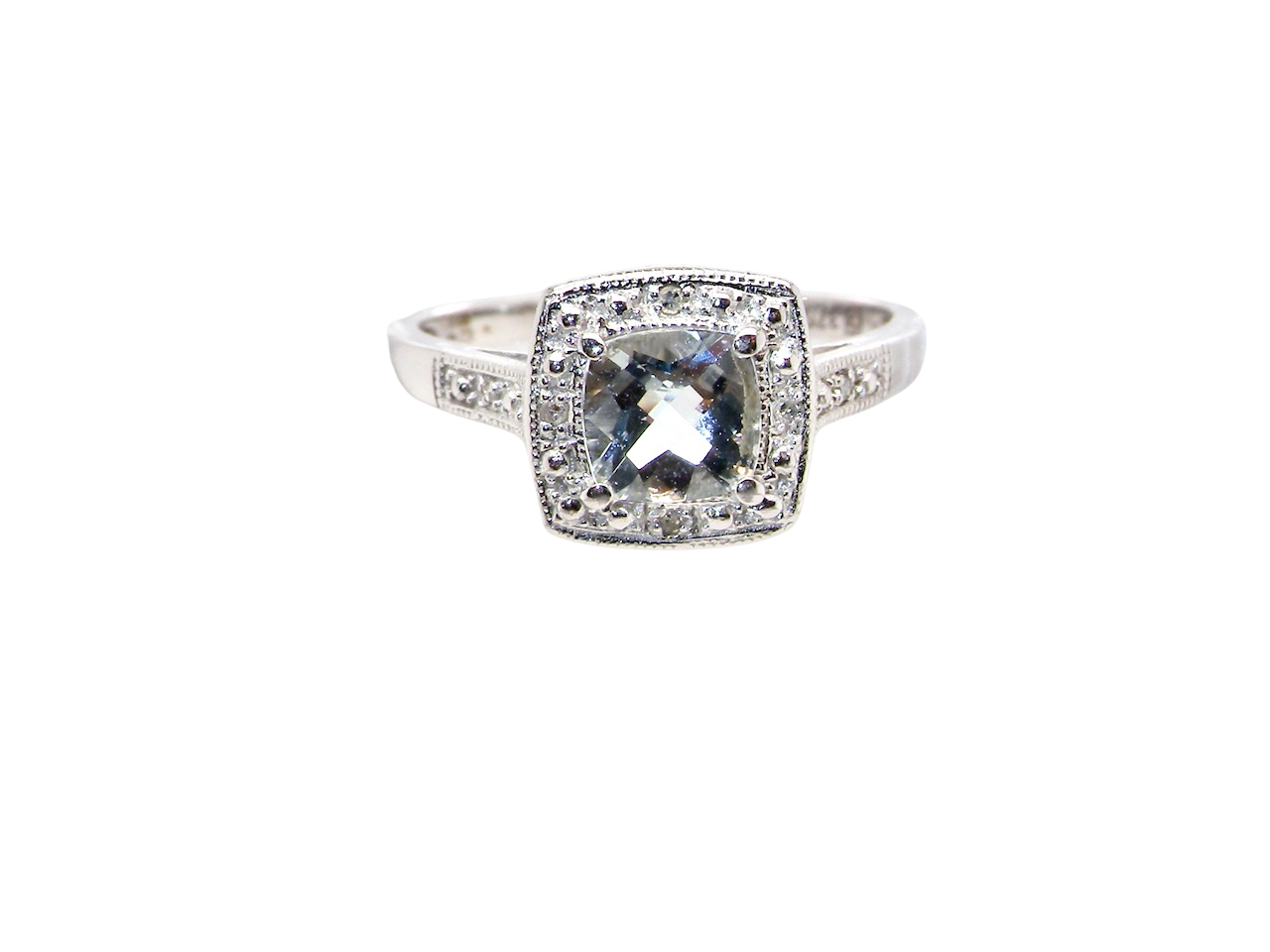 cushion shaped An Aquamarine and Diamond cluster ring