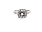 cushion shaped An Aquamarine and Diamond cluster ring