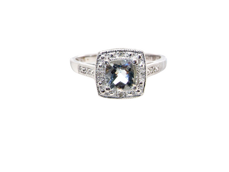 cushion shaped An Aquamarine and Diamond cluster ring