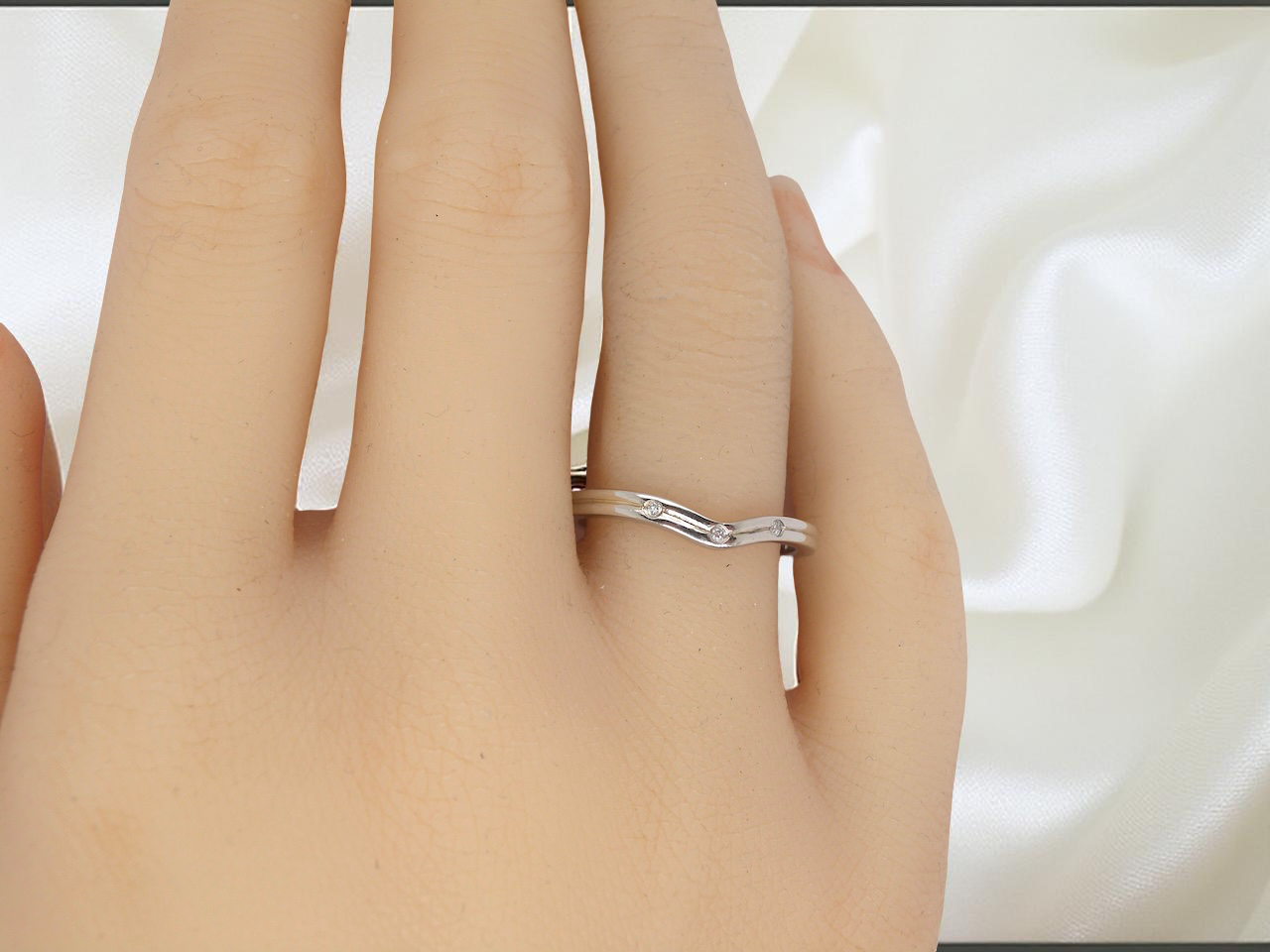 A diamond wishbone ring