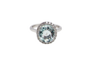  elegant cluster ring centred on a beautiful oval aquamarine, 