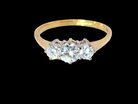  elegant modern trilogy ring is set with three brilliant-cut white diamonds 