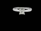 An emerald cut platinum solitaire Diamond Ring