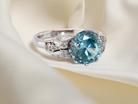  fine Art Deco ring that features a stunning natural blue zircon centre stone  side
