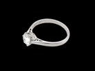 fine solitaire ring featuring a single brilliant-cut white diamond, measuring approximately 6mm (estimated 0.75 carats). side
