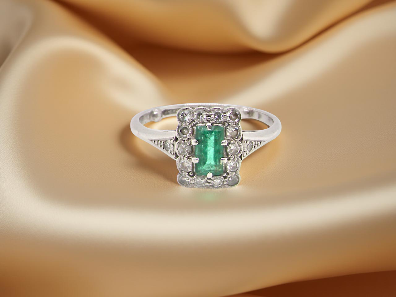 fine A vintage Emerald and Diamond Cluster ring