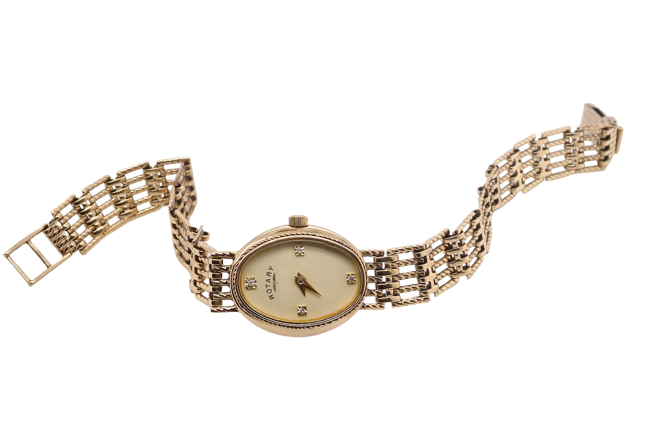 full view A 9 carat gold wrist watch by Rotary. Oval dial with a diamond dot at the 12. Champagne coloured dial.