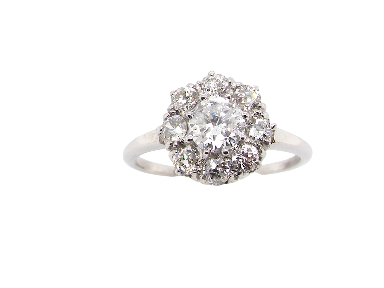  gorgeous vintage cluster ring that has as its principal setting&nbsp; an old brilliant cut white diamond, 