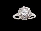  gorgeous vintage cluster ring that has as its principal setting&nbsp;  old brilliant cut white diamond, 