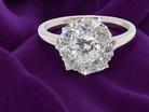  gorgeous vintage  ring that has as its principal setting&nbsp; an old brilliant cut white diamond, 