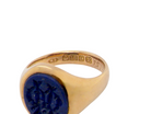 hallmarks An 18 carat gold signet ring set with an oval lapis lazuli stone. This measures 12x9.5mm and has a carved intaglio seal engraved onto the stone. (These seem to be floral patterns)