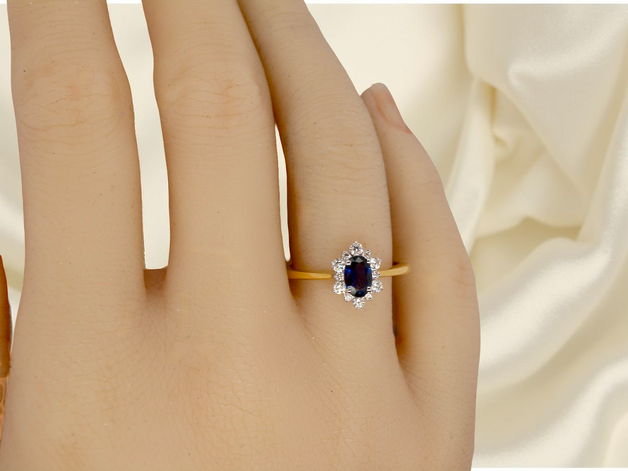 A pretty 18 carat gold Sapphire and Diamond ring