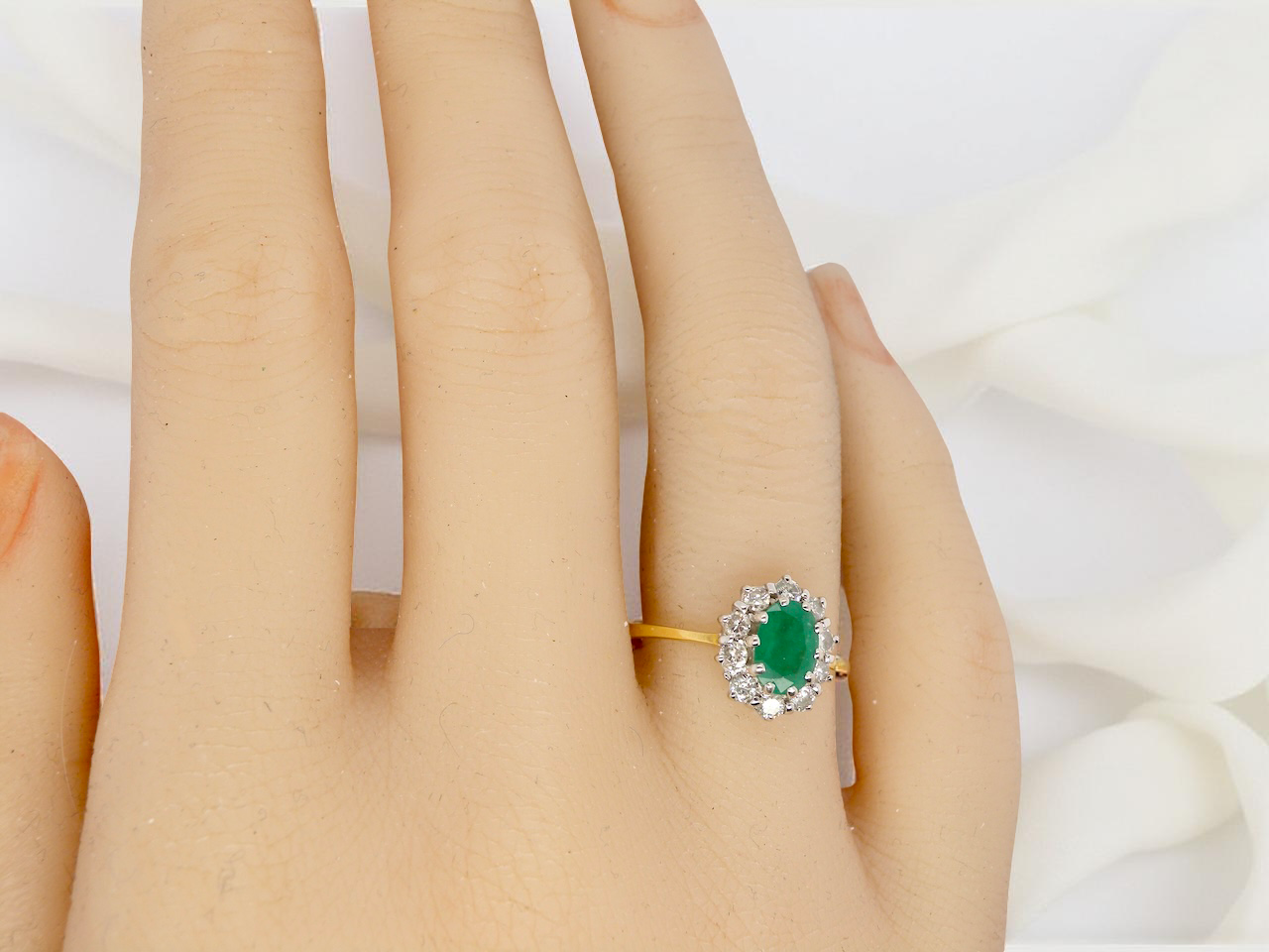 A 1980s traditional Emerald and Diamond Ring