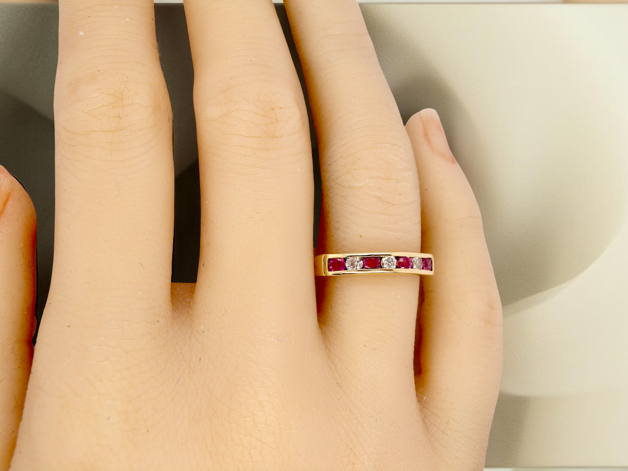 A 9 carat Yellow Gold Ruby &amp; Diamond Eternity Ring