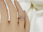 hand A Morganite and Diamond cluster ring