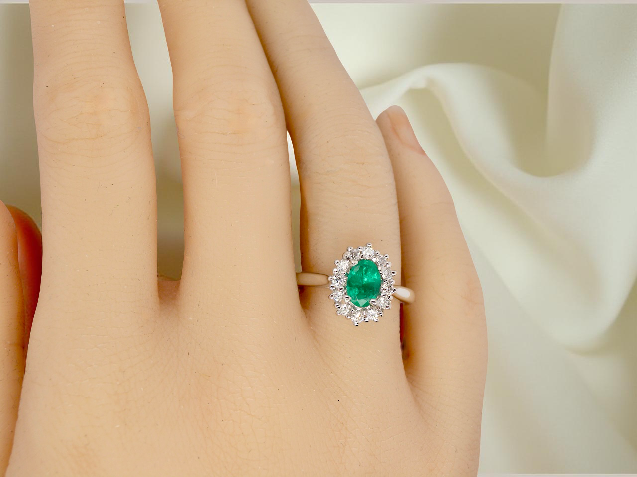 A NEW Emerald and Diamond ring
