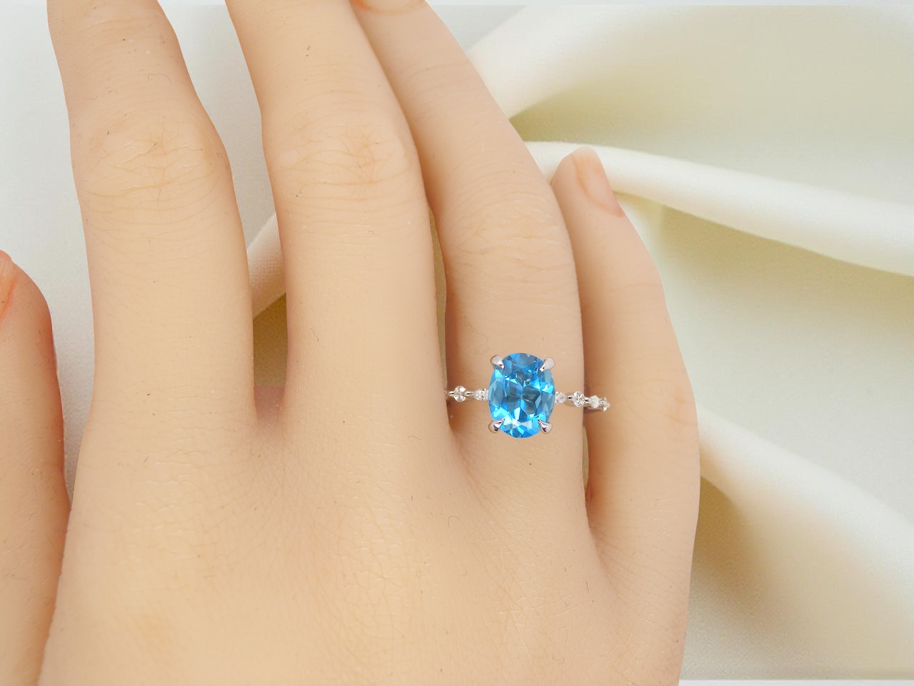 hand A NEW ring- but with a gemstone that we have taken from an old ring that was worn out, so its a new lease of life!&nbsp; The topaz measures 9x7mm.