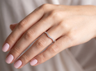 hand A Platinum half hoop ring featuring a gently contoured U-shaped centre, designed to allow a cluster or solitaire ring to sit comfortably alongside.