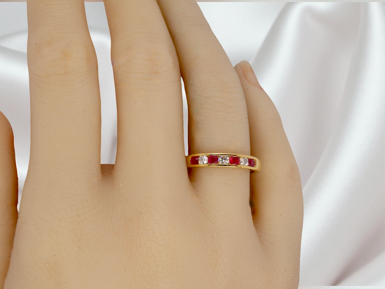 A channel set Ruby and Diamond ring