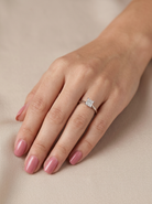 hand A fine solitaire ring featuring a square cut diamond of excellent quality.

Superb colour grade of E, excellent clarity- graded VVS2*. Stone measures 5x5x3.68, confirmed as 0.83 carats.