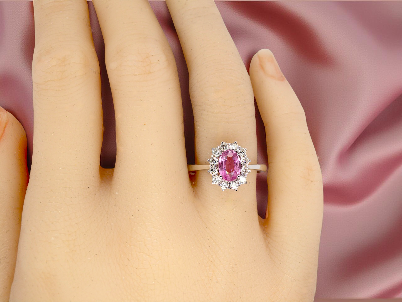 A modern Pink Sapphire and Diamond Ring