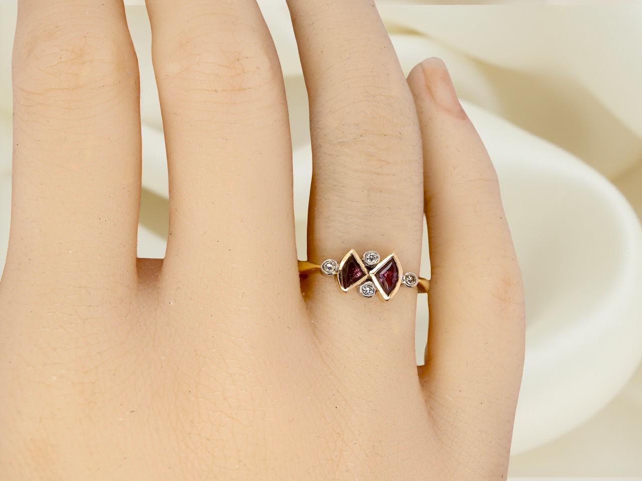A pink tourmaline and diamond ring