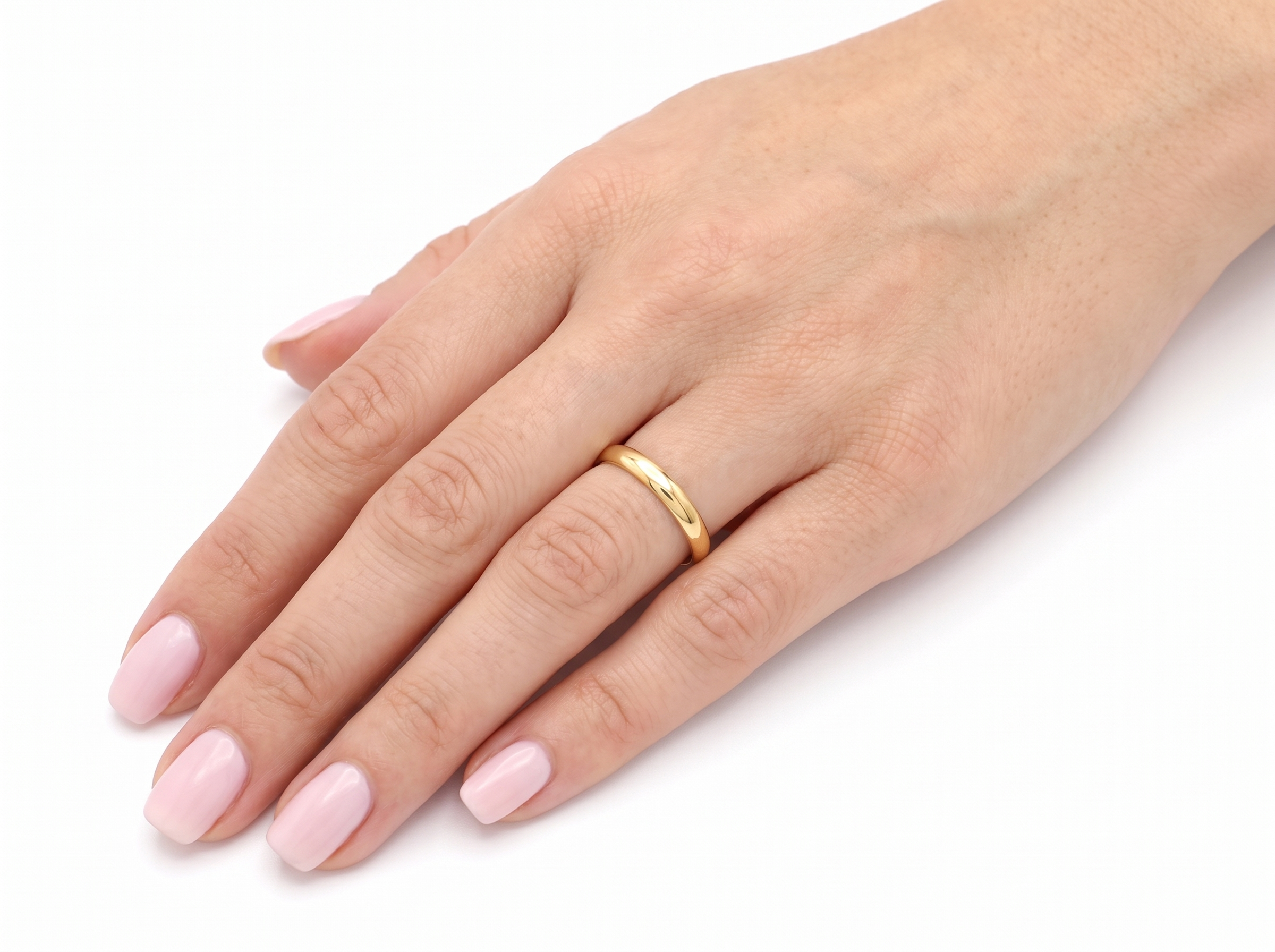 hand A plain 18 carat gold wedding ring. 3.8mm width, weight 5.4grams.&nbsp;