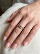 hand A pretty 15 carat gold Victorian dress ring. Hallmarks for Chester 1892.

