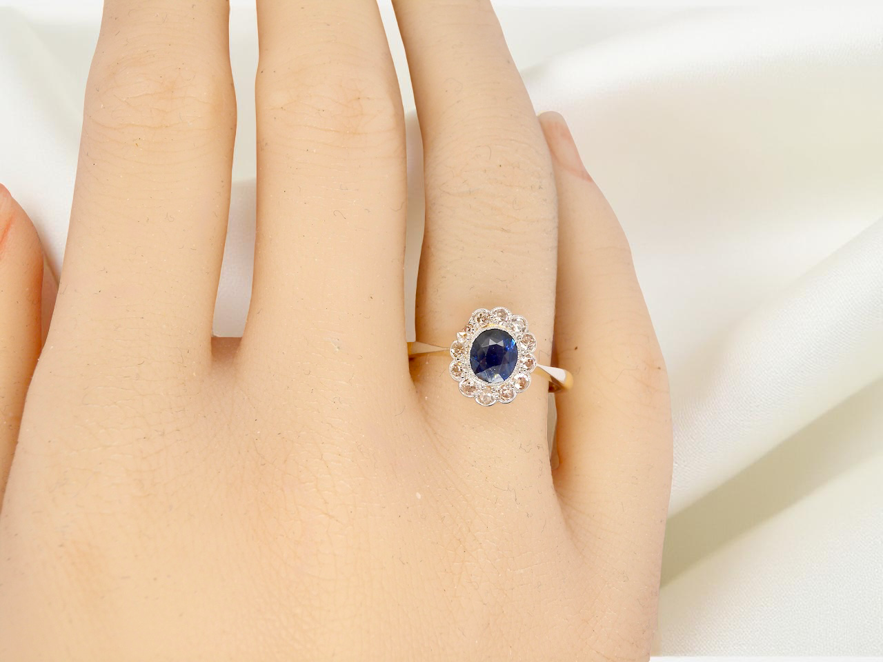A pretty vintage Sapphire and Diamond cluster ring