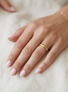 hand A traditional 18 carat gold wedding ring. D shape profile.

Substantial weight at 5.6grams 