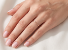 hand A vintage 18 carat gold* wedding ring. Narrow 2mm width, D shape profile