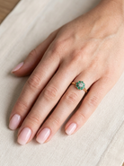 hand A vintage 1960s cluster ring. Principal stone a brilliant cut white diamond, 0.45 carats (5mm diameter)&nbsp;