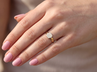 hand A vintage 9 carat gold signet ring. Six sided head shape,