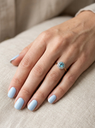 hand A vintage mid 20th century cluster ring.&nbsp;

Centre stone a natural blue zircon, 7mm diameter. 