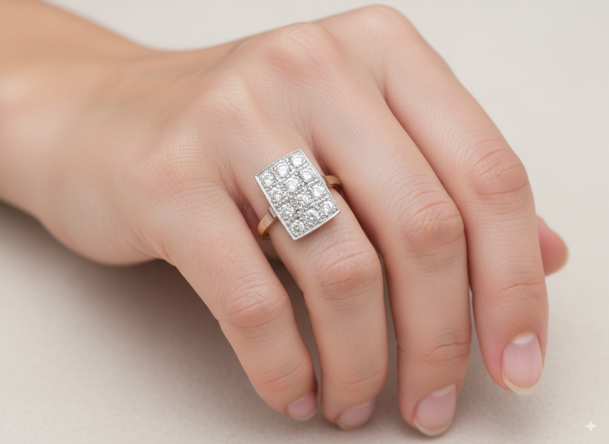 An Art Deco Diamond panel ring