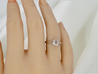 hand An impressive platinum solitaire ring set with a modern brilliant-cut white diamond.