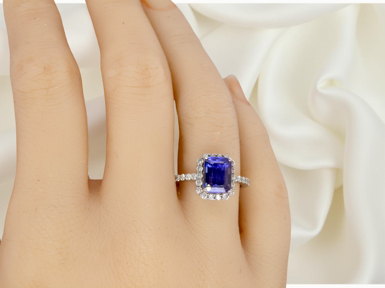 hand  cluster ring featuring a 4A quality Tanzanite as its centre stone. 