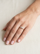 hand  ring is set with three brilliant cut white diamonds, each 3mm diameter. (total estimated at 0.30 carats) Colour h-j, clarity Si. Claw set head, white gold, 