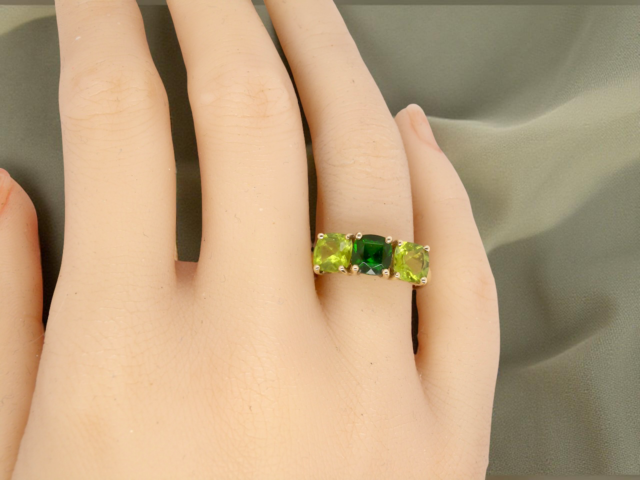 hand  striking vintage dress ring showcases a cushion-cut spinel 