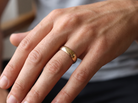 hand A traditional wedding ring. 9 carat gold and suitable as a ring for a man. Width 7.5mm, D shape profile.